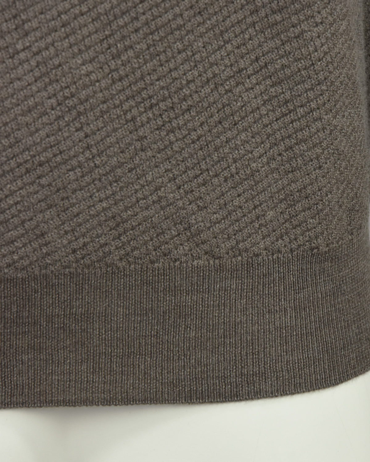 Taupe textured knit polo hem with ribbed cuff band