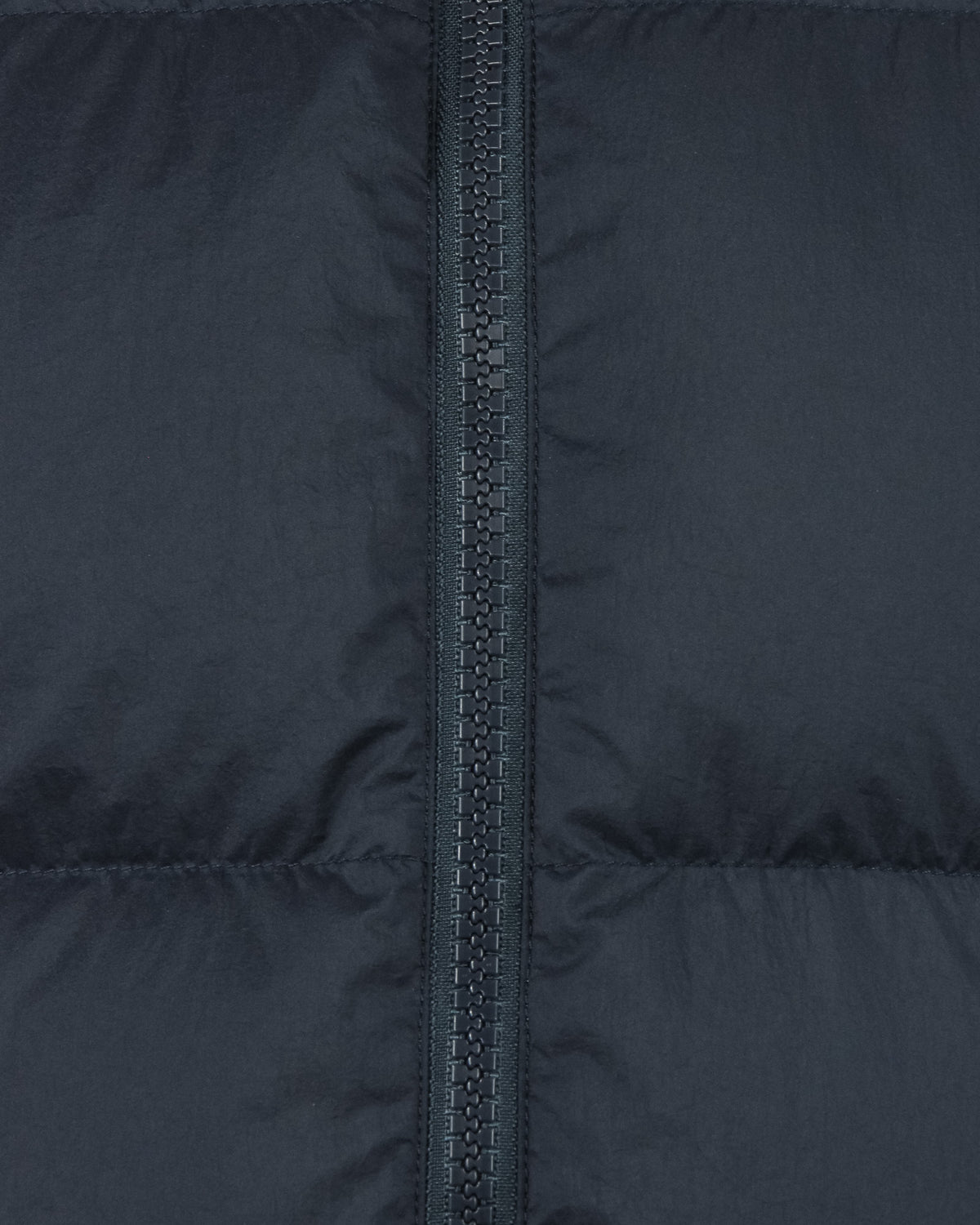 Dark navy crinkle down jacket front close-up of full-length zipper