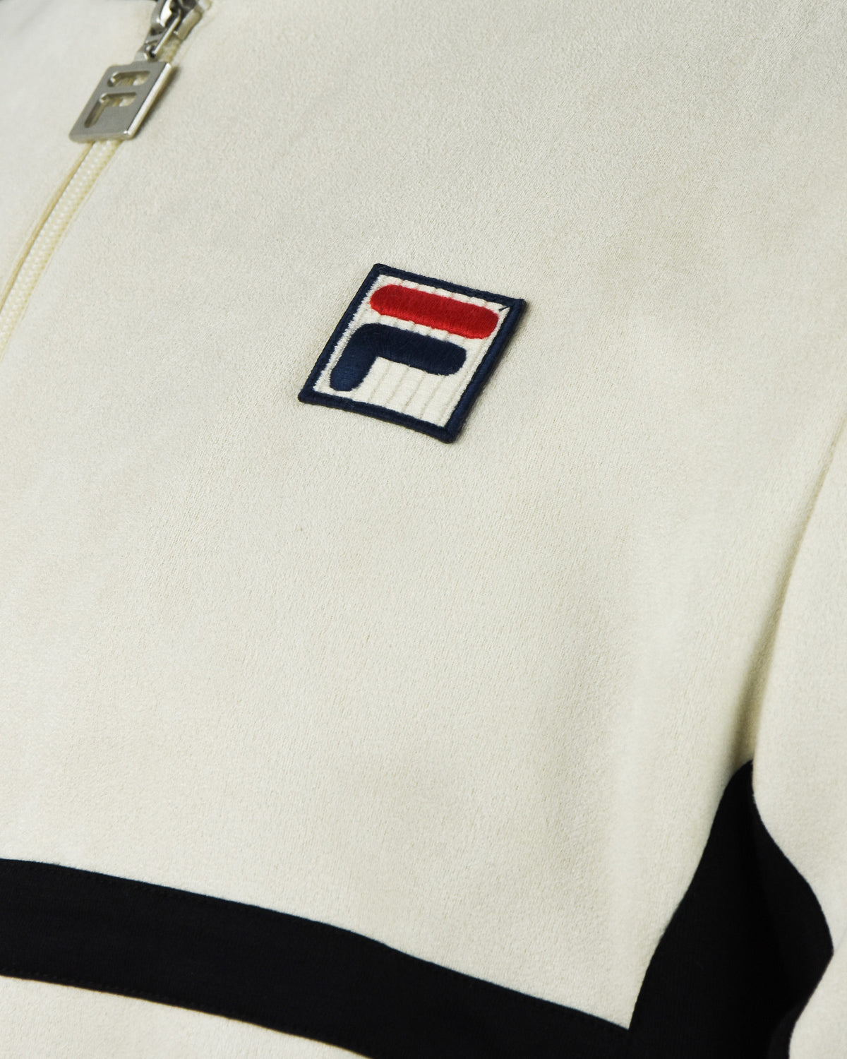 Cream baseball jacket with Fila logo patch and gold-tone zipper hardware