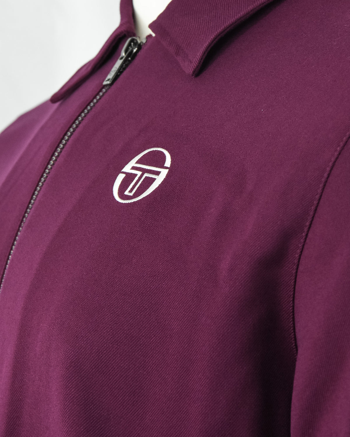 Purple track jacket chest logo with full zipper and stand collar