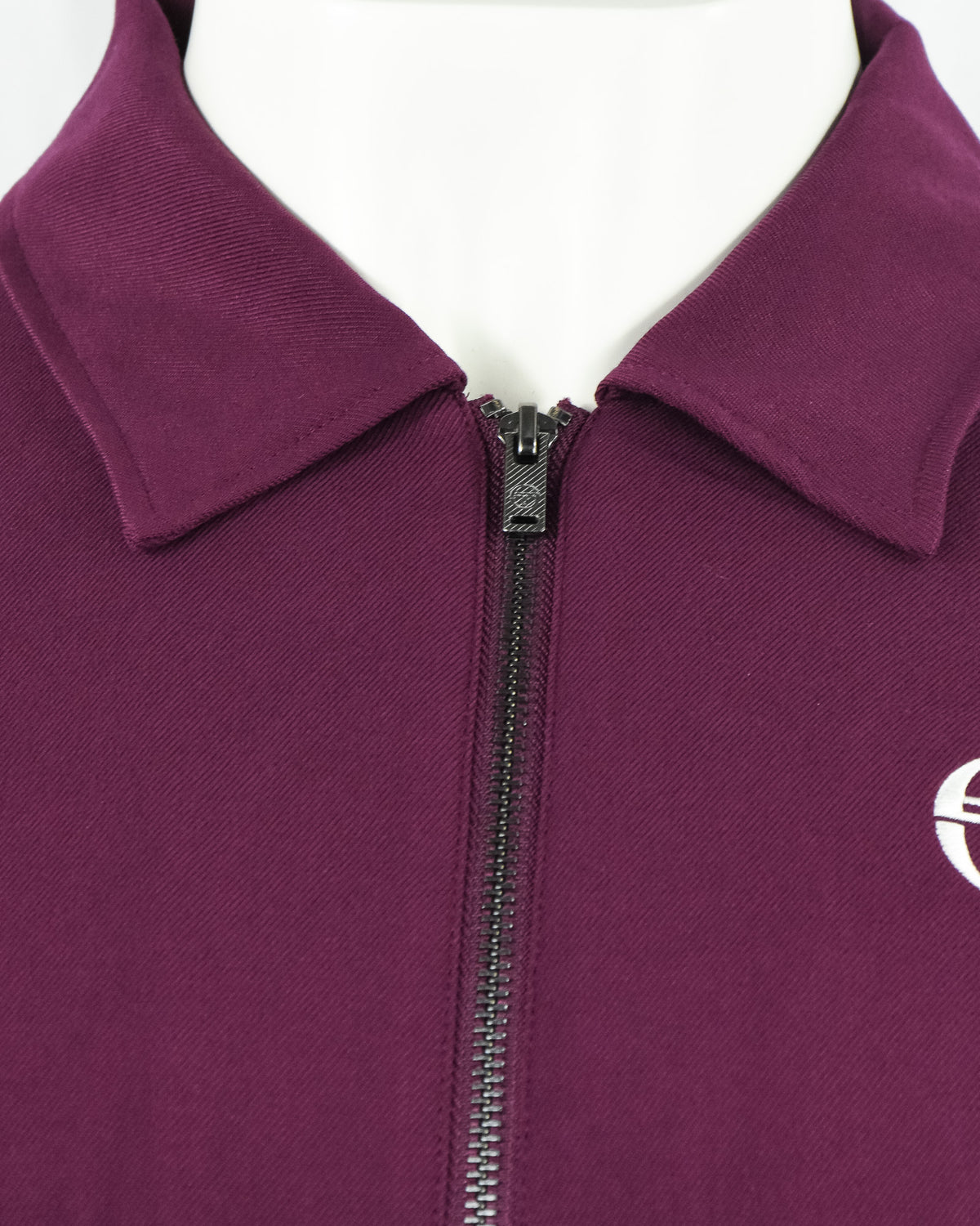 Purple track jacket front with stand collar and central zipper
