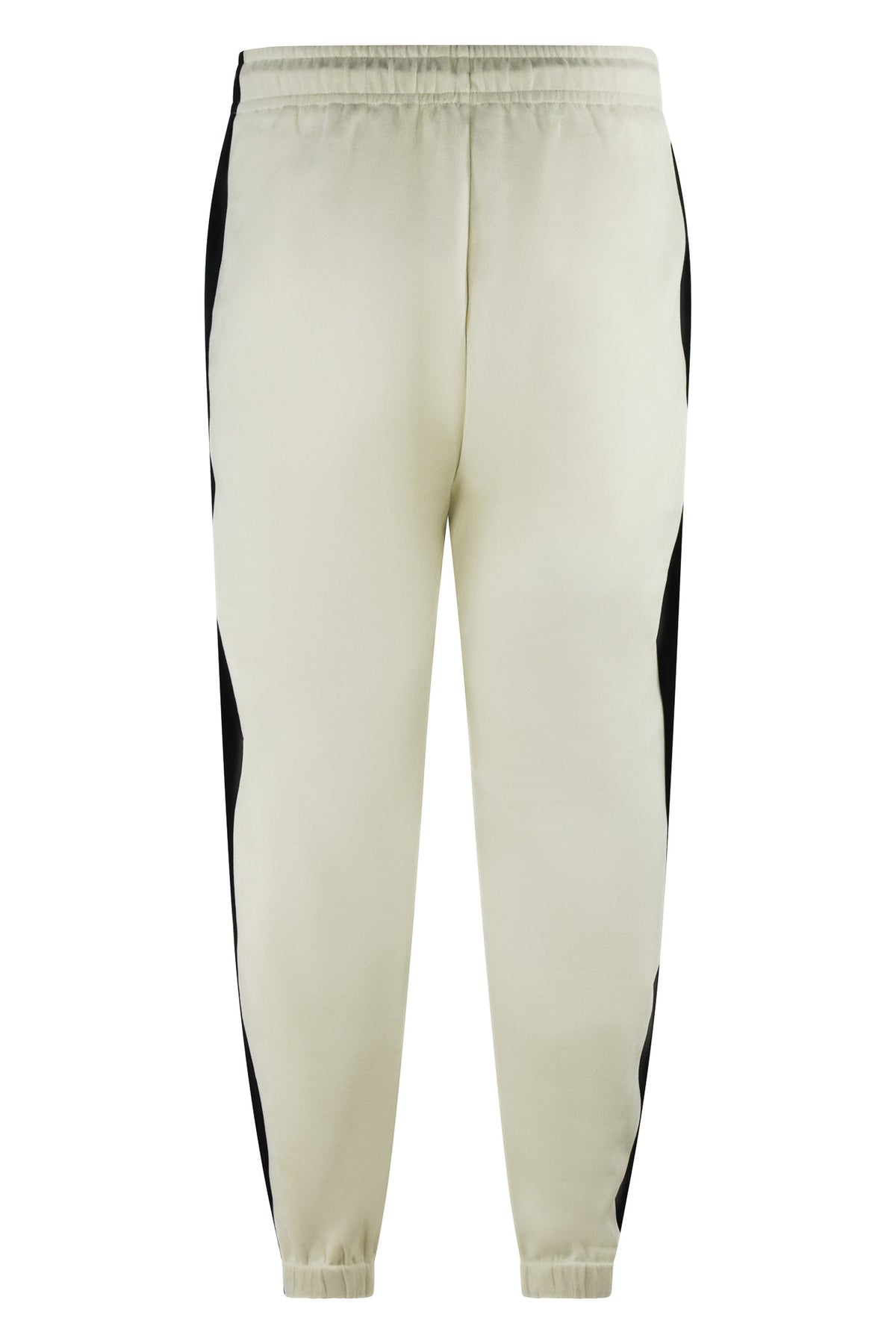 Cream track pants with black side panels and elastic cuffs, front drawstring