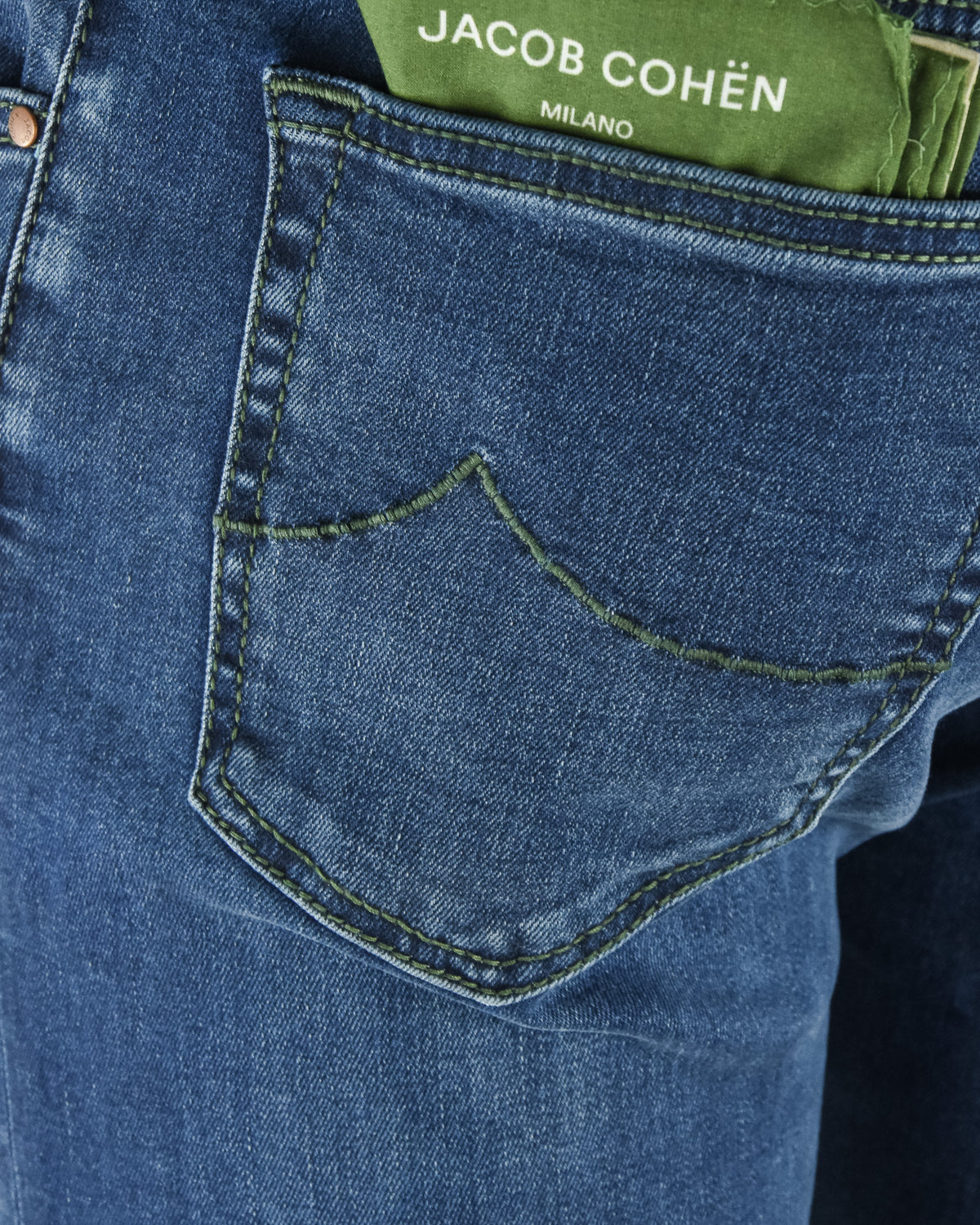 Front coin pocket with green-edged stitching and JACOB COHEN Milano green waistband label.