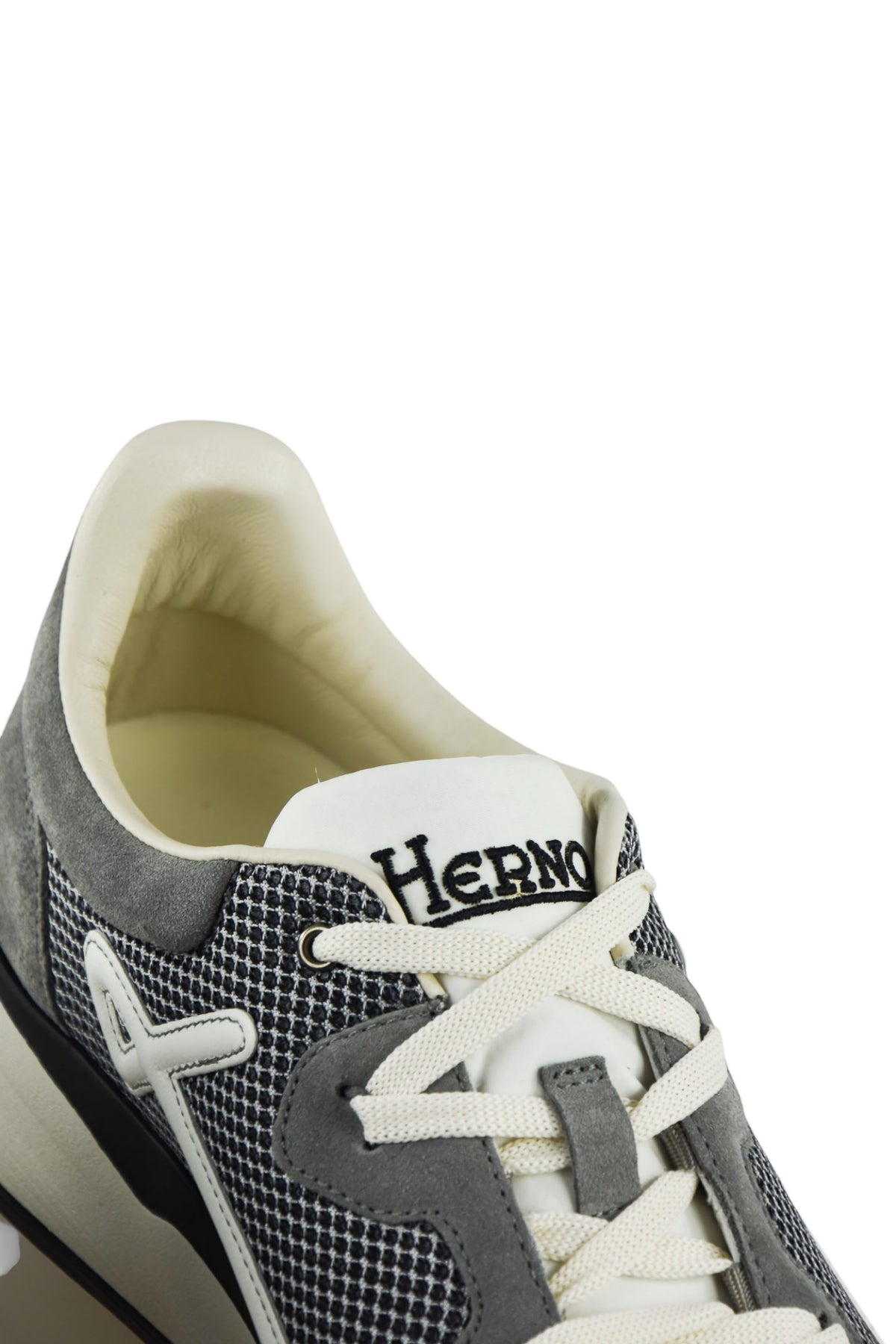 Grey trainers with white laces and Herno logo on tongue, olive-toned lining
