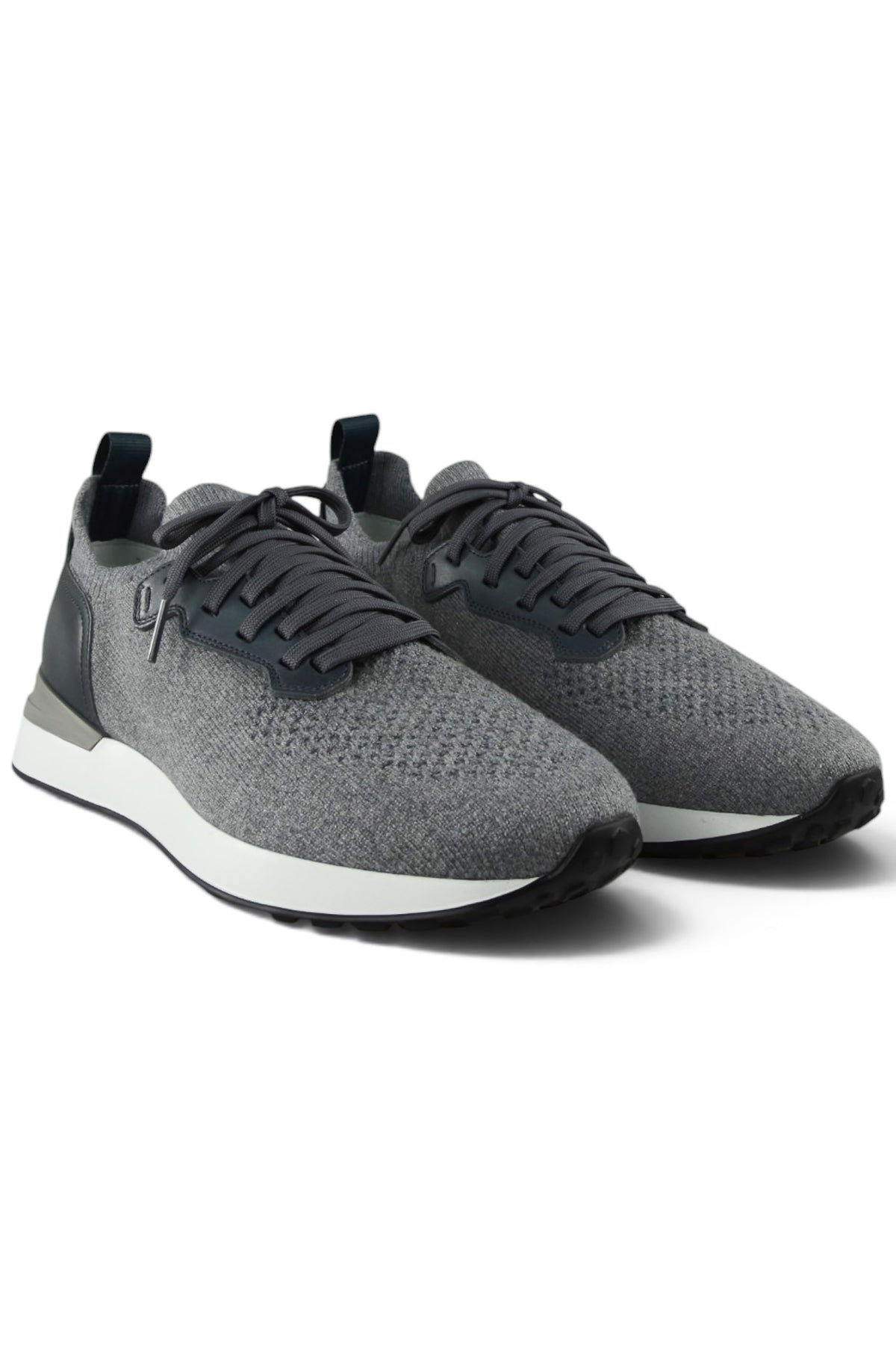 Pair of grey knitted lace-up trainers with leather side panels and white sole