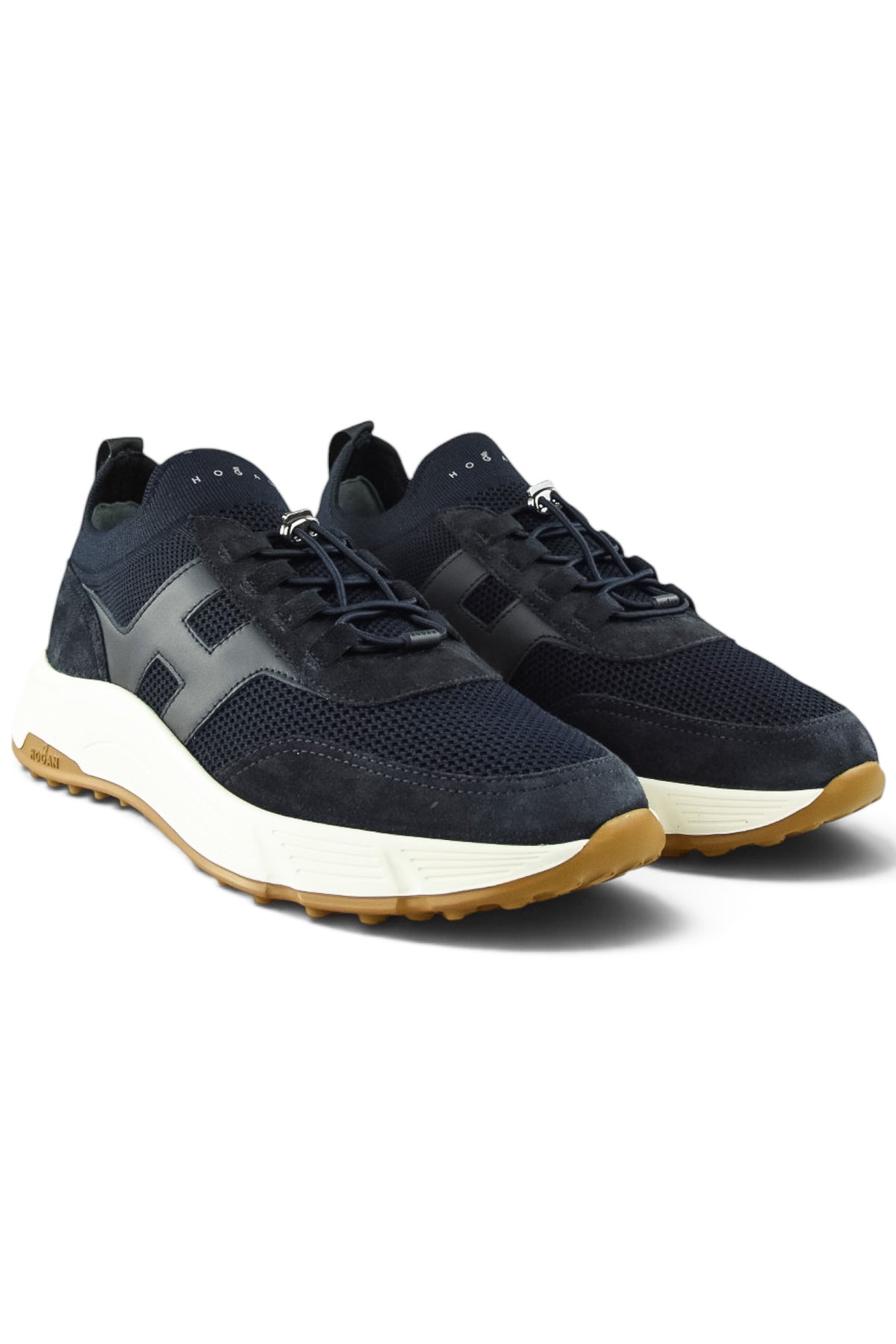 Pair of navy lace-up trainer sneakers with suede overlays and white midsole