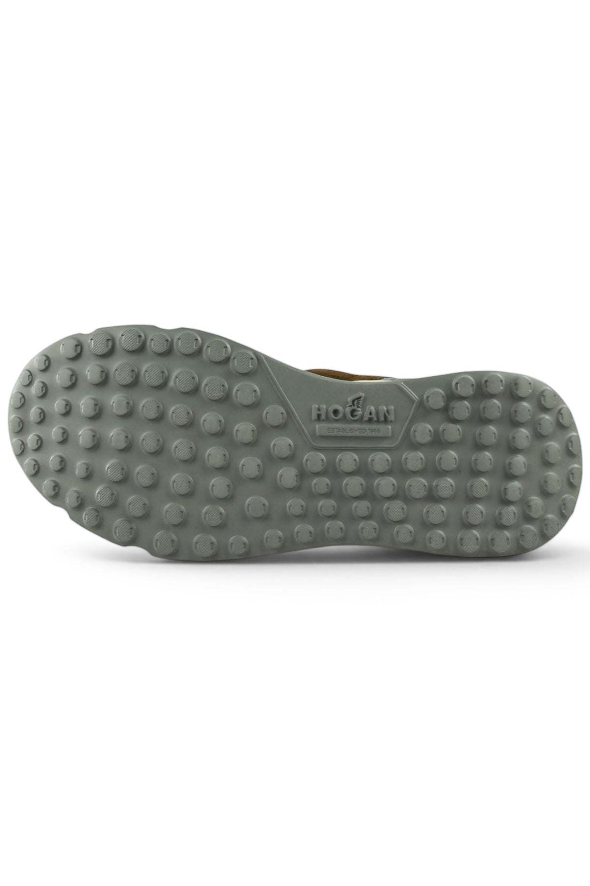Hogan runner trainer outsole with dark tread dots and heel traction