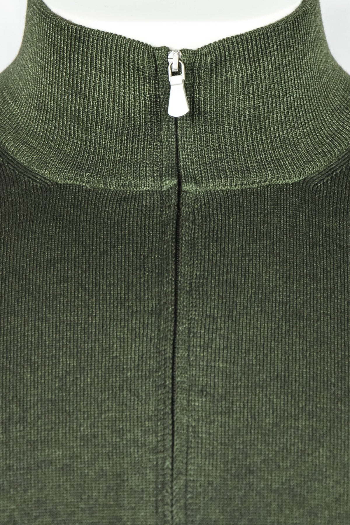 Bottle green mock-neck full-zip cardigan with visible zipper pull at collar
