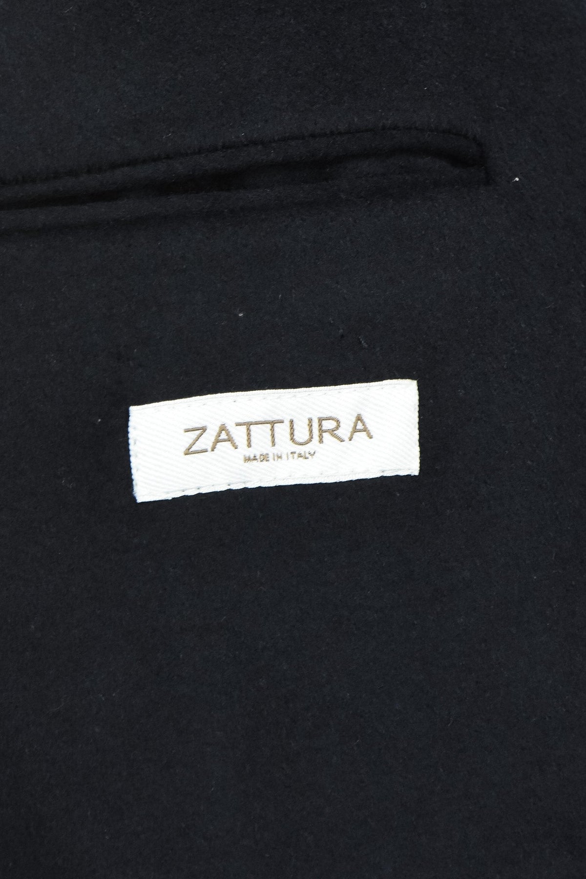 Wool and cashmere overcoat interior with ZATTURA label and welt pocket