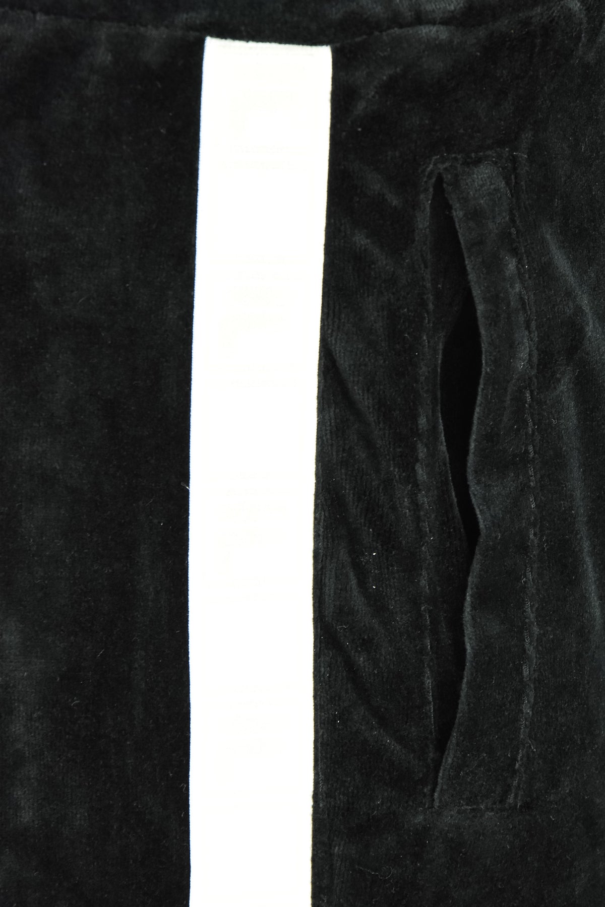 Black velour track pants with white side tape stripe and side pocket