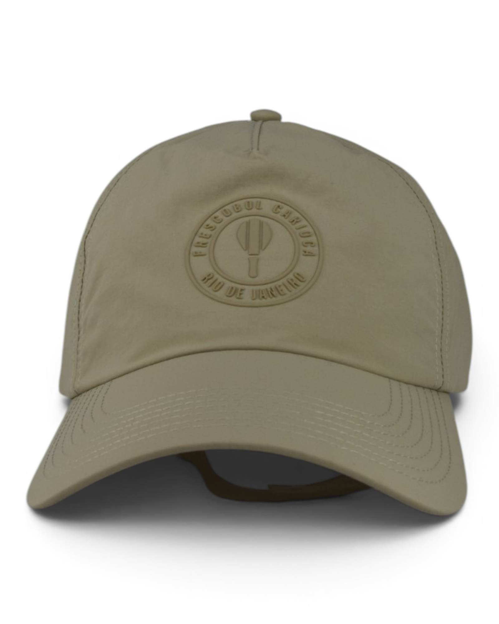 Beige nylon cap with front circular logo stamp and curved brim
