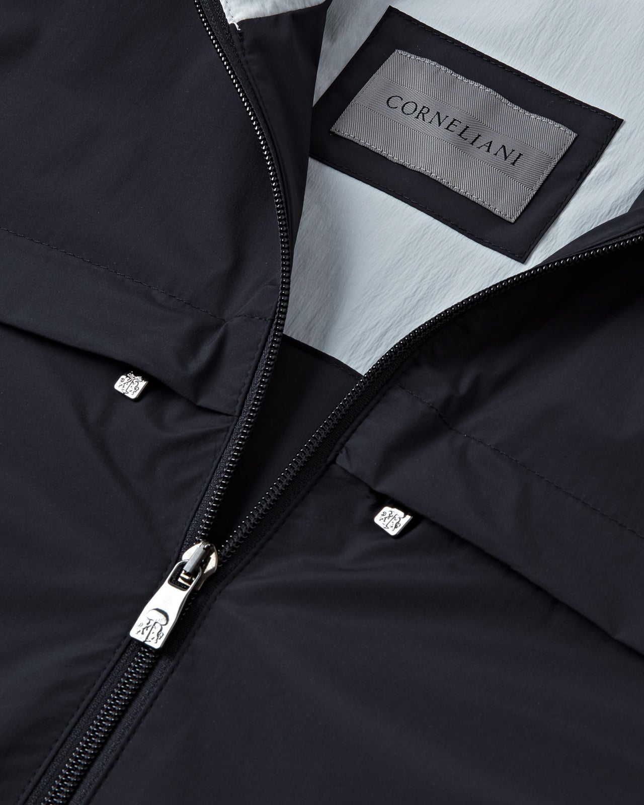 Navy jacket lining with CORNELIANI label and zippered interior seam
