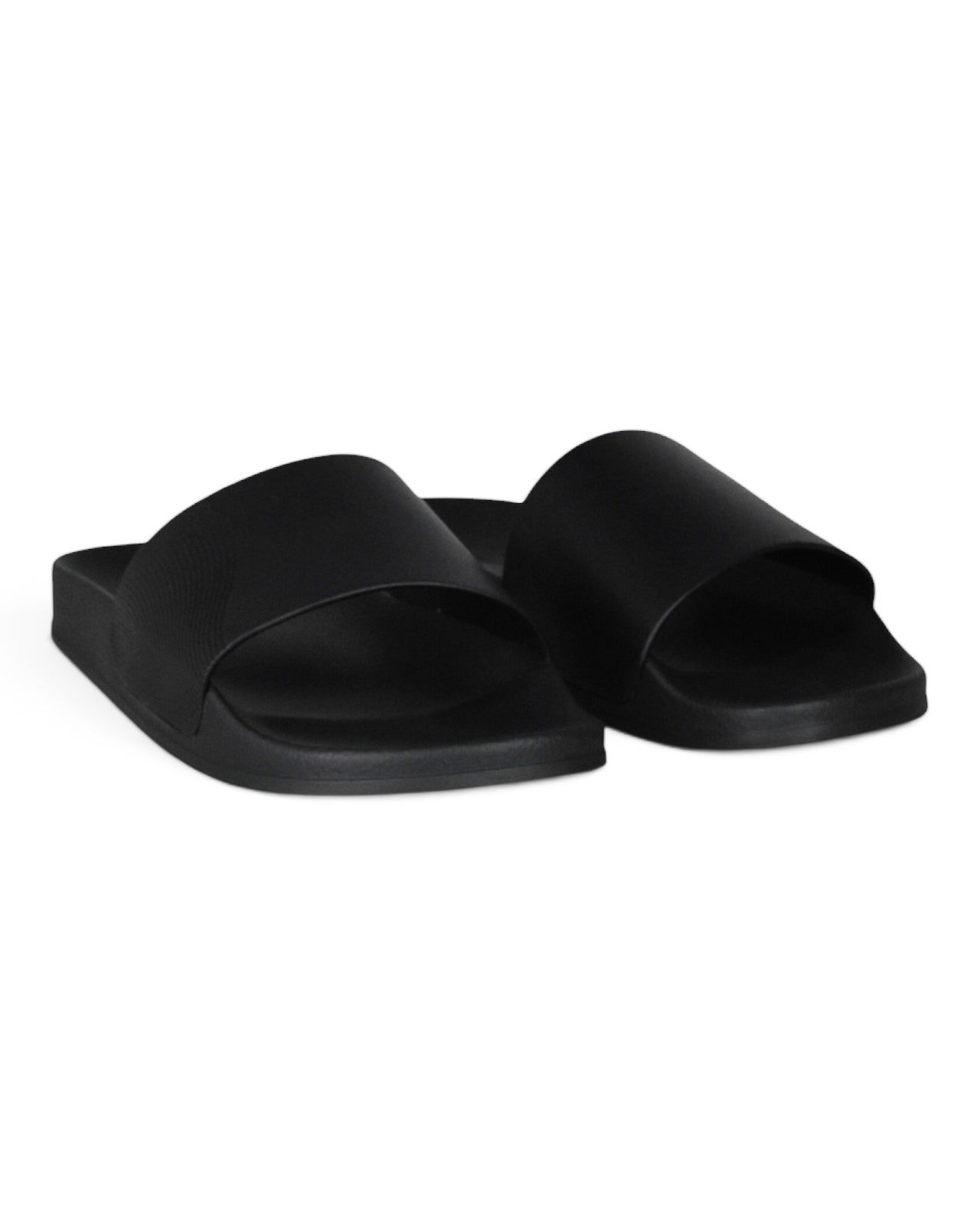 Black leather slide sandals with open toe and sculpted footbed