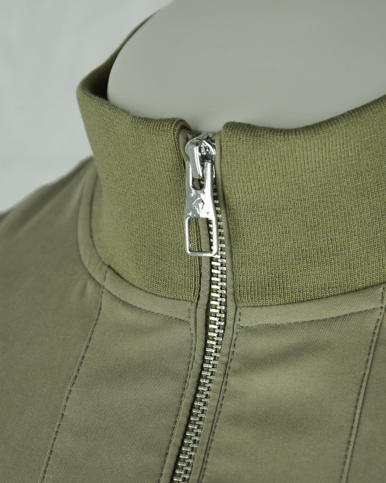 Smoke green blouson jacket zipper with rib-knit collar trim