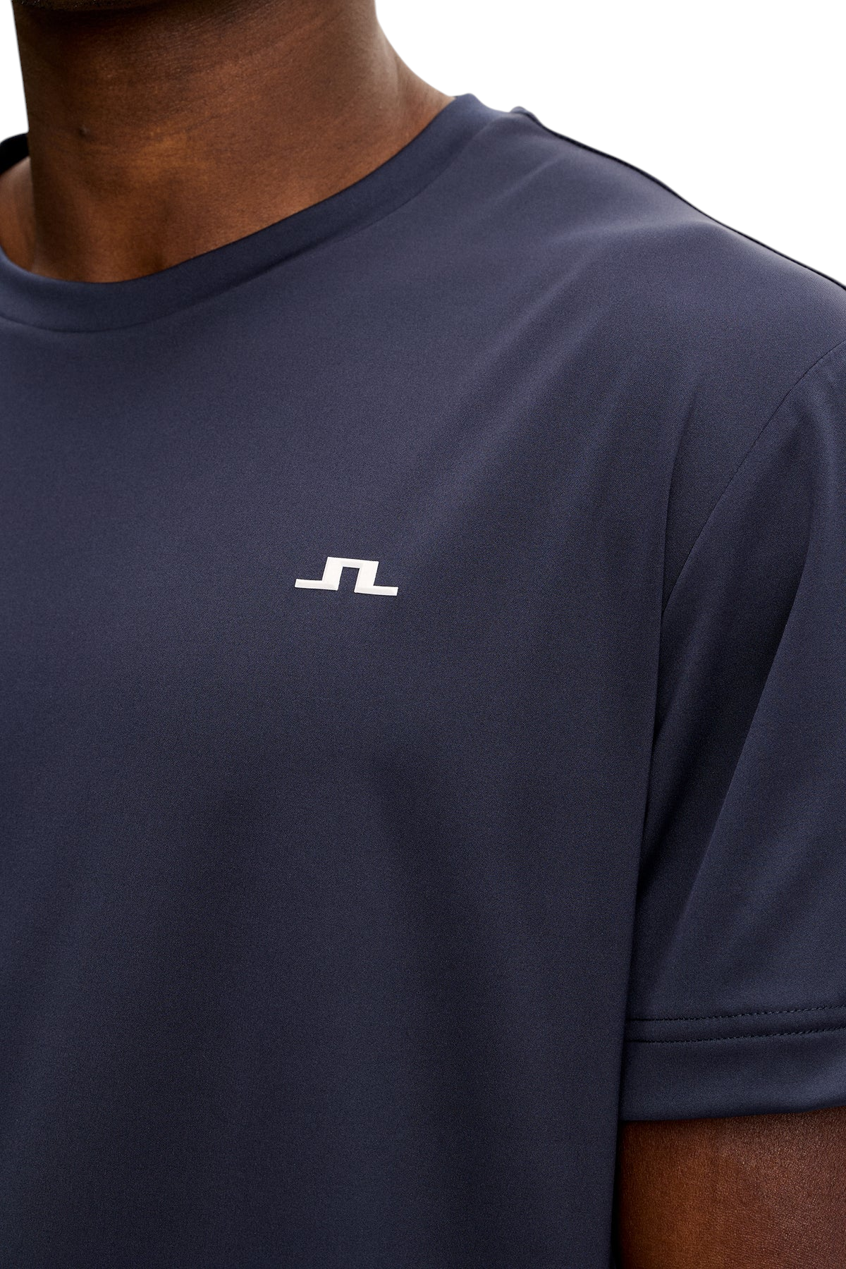 Men's navy T-shirt with small white chest logo