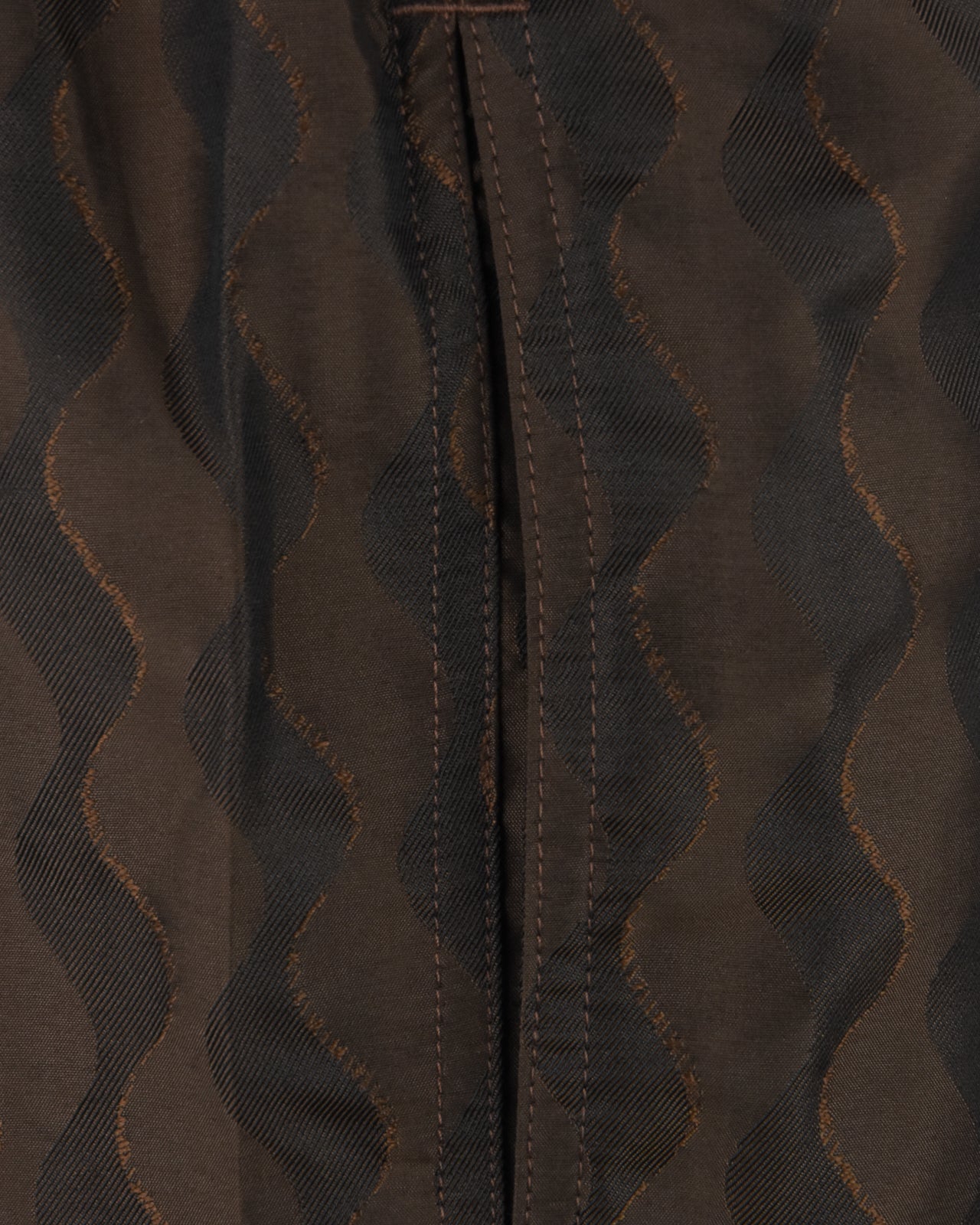 Swim shorts close-up of inner panel seam with contrasting stitching