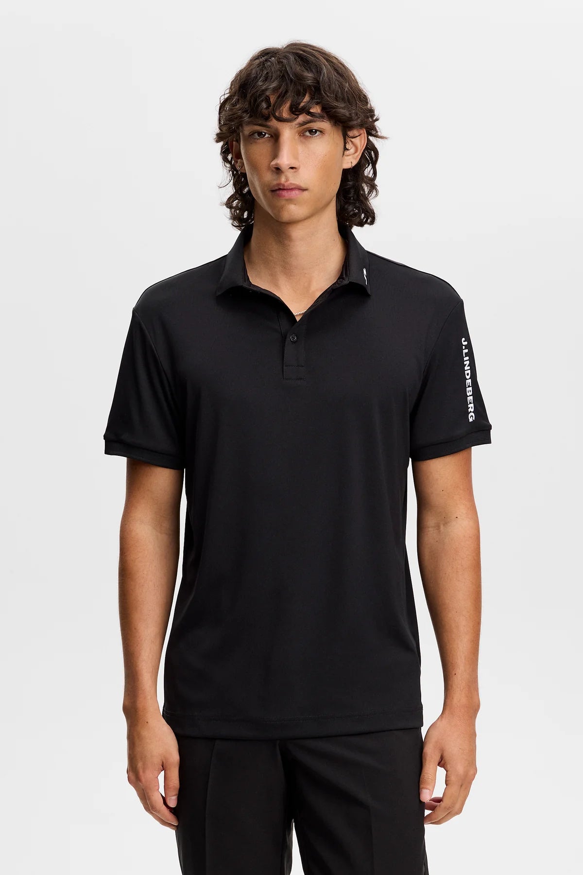 Black polo shirt with short sleeves and button-front collar