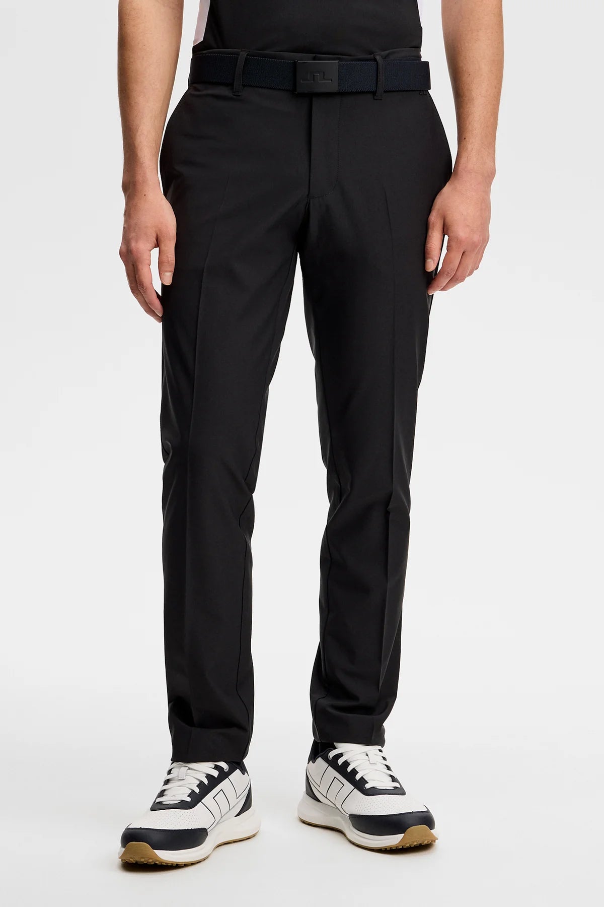 Black straight-leg pants with belt loops, center seam, and button-front closure