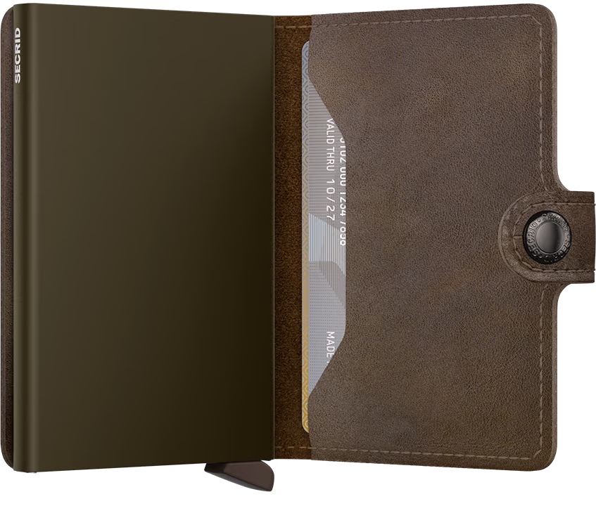 Secrid mini wallet open view showing card slots and dark brown leather shell.