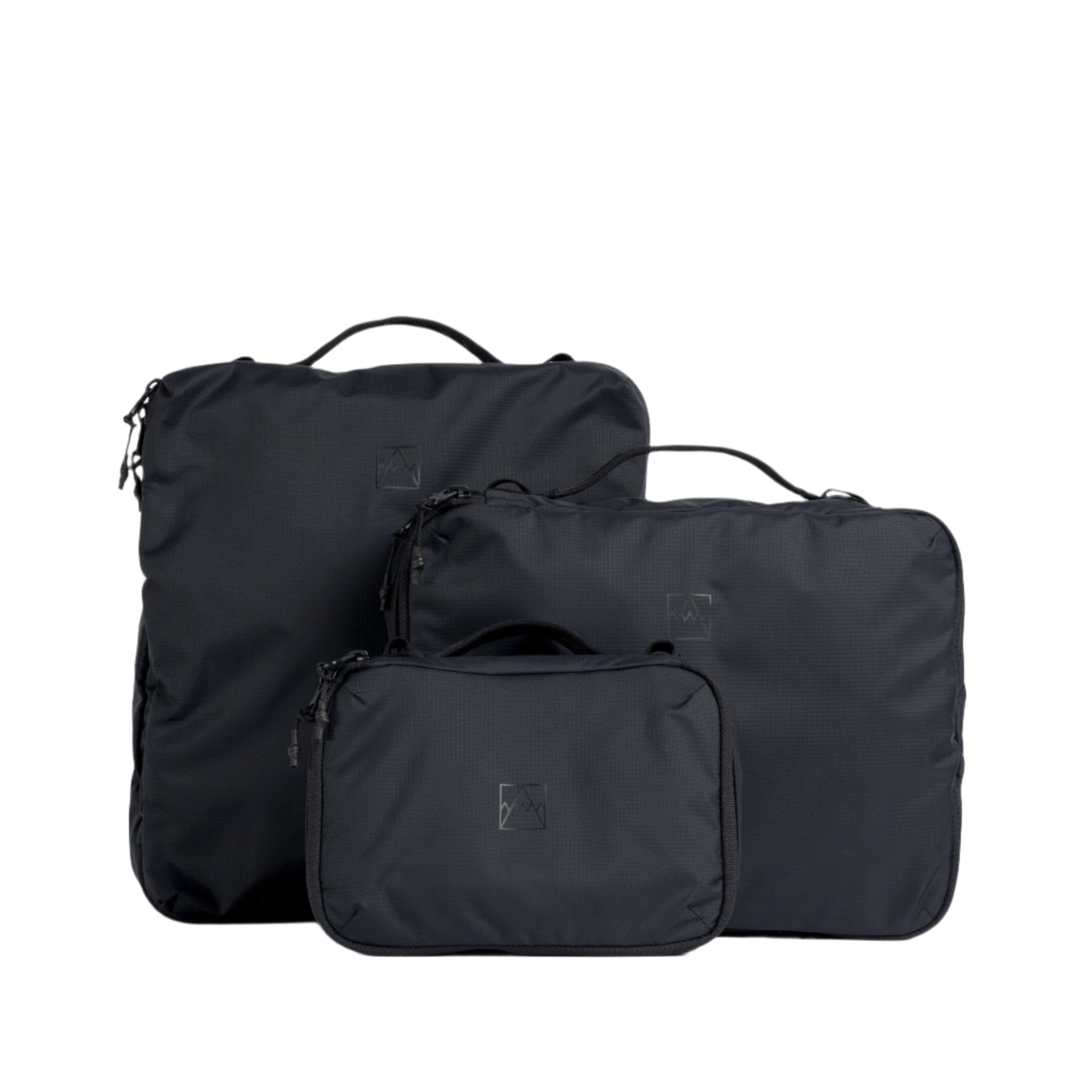 Set of black packing cubes, one larger and one small, each with zippers
