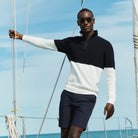 Men's dark navy stretch travel shorts, mid-thigh length