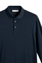 Navy long-sleeve polo with fold-over collar and button placket, chest J.Lindeberg logo