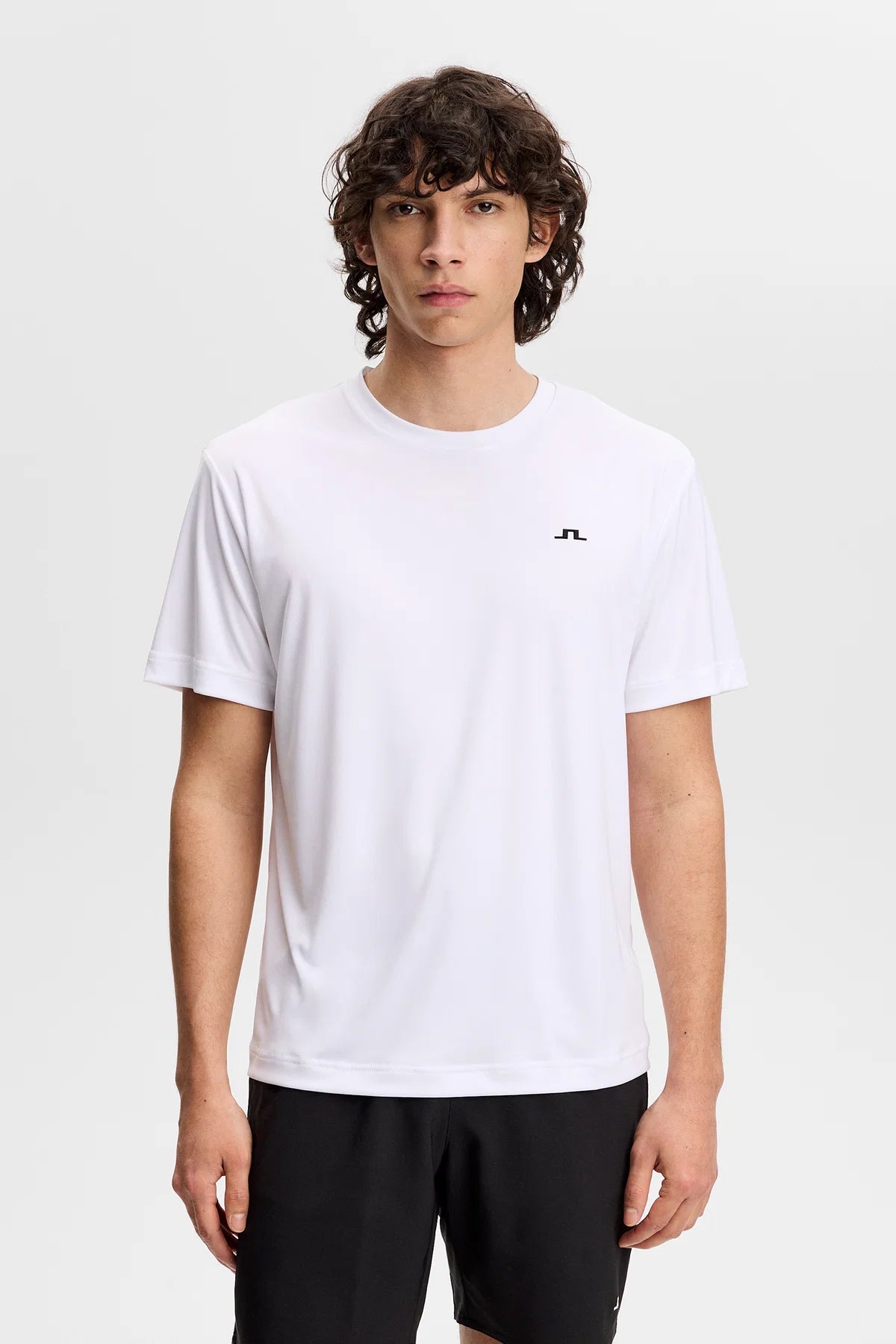 White crew-neck T-shirt with small chest logo, front view