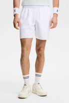White pull-on shorts with elastic waist, mid-thigh length and side seam.