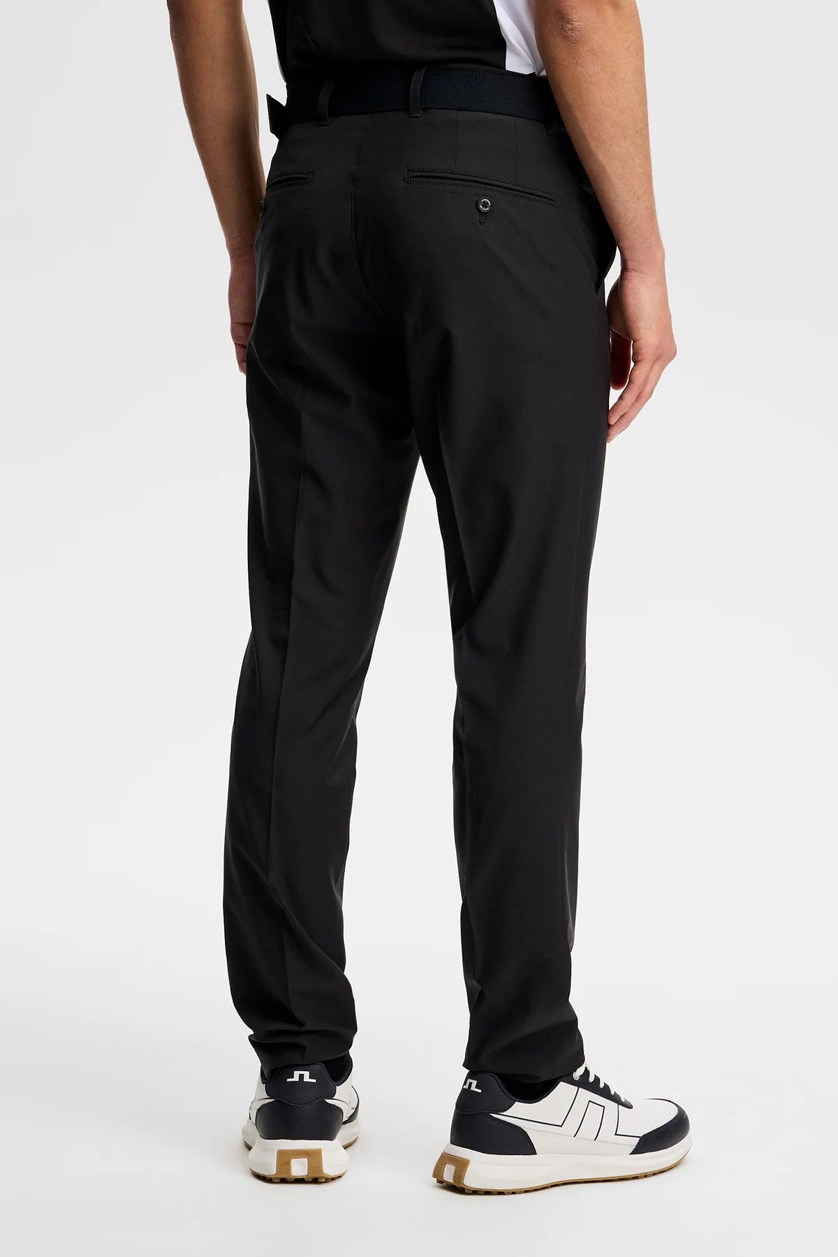 Black mens dress pants with belt loops, tapered straight legs, and slanted pockets