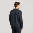 Deep navy crewneck sweater back view with ribbed cuffs and hem, long sleeves