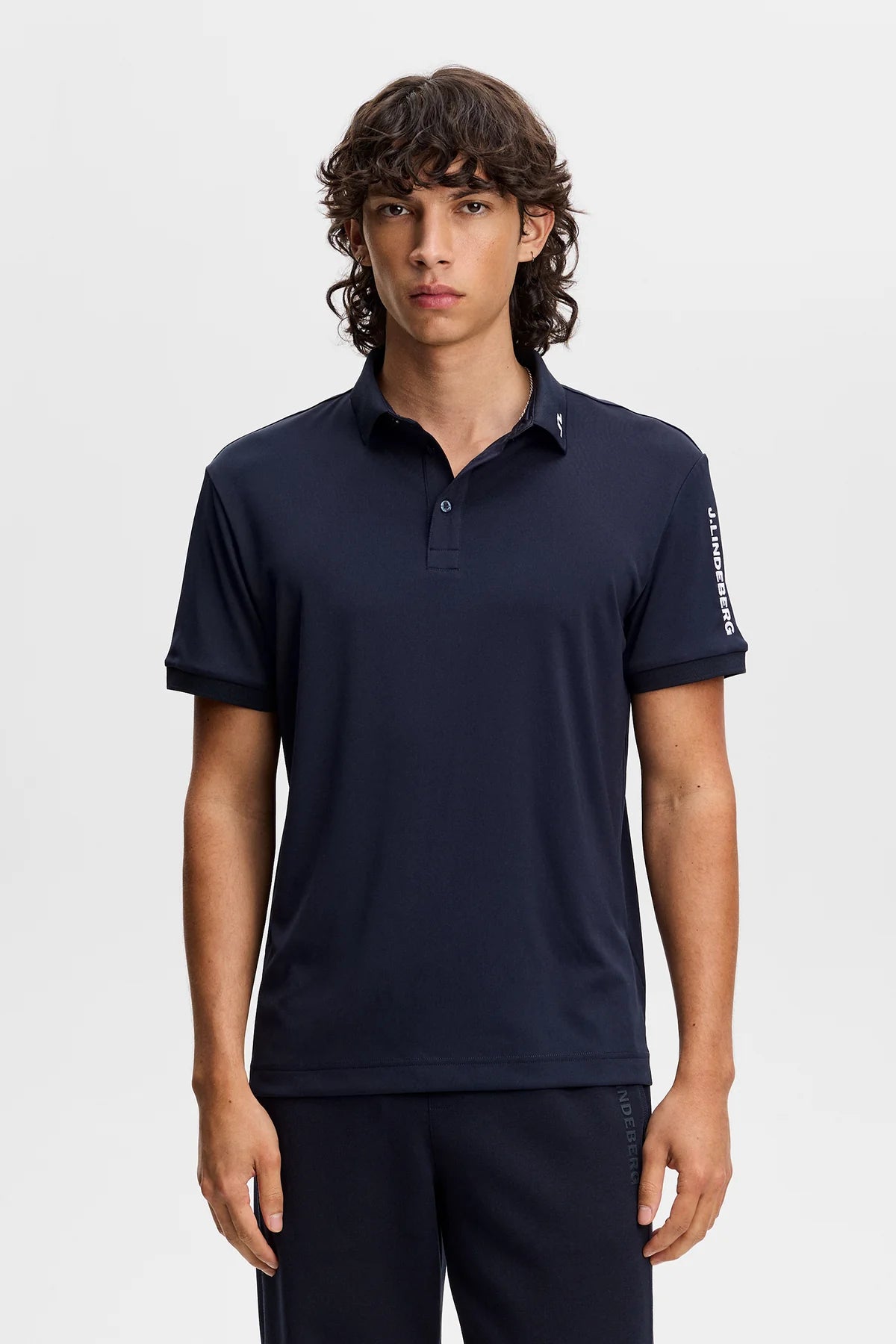 Men's navy J.Lindeberg tour tech polo, front button placket and sleeve logo