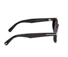 Shiny black sunglasses side profile with tinted lenses and gold-tone hinge accent
