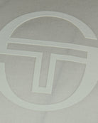 Off-white T-shirt close-up of embossed circular logo graphic