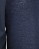 Navy textured knit sleeve panel on hybrid zip jacket.