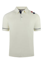 Cream terry polo shirt with knit collar and navy button placket