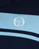 Kids polo shirt chest logo on light blue stripe with navy and blue stripes