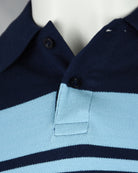 Kids polo shirt collar and buttons with navy top and light blue stripe panel