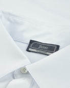 White polo shirt with Herno brand label on the inside neckline