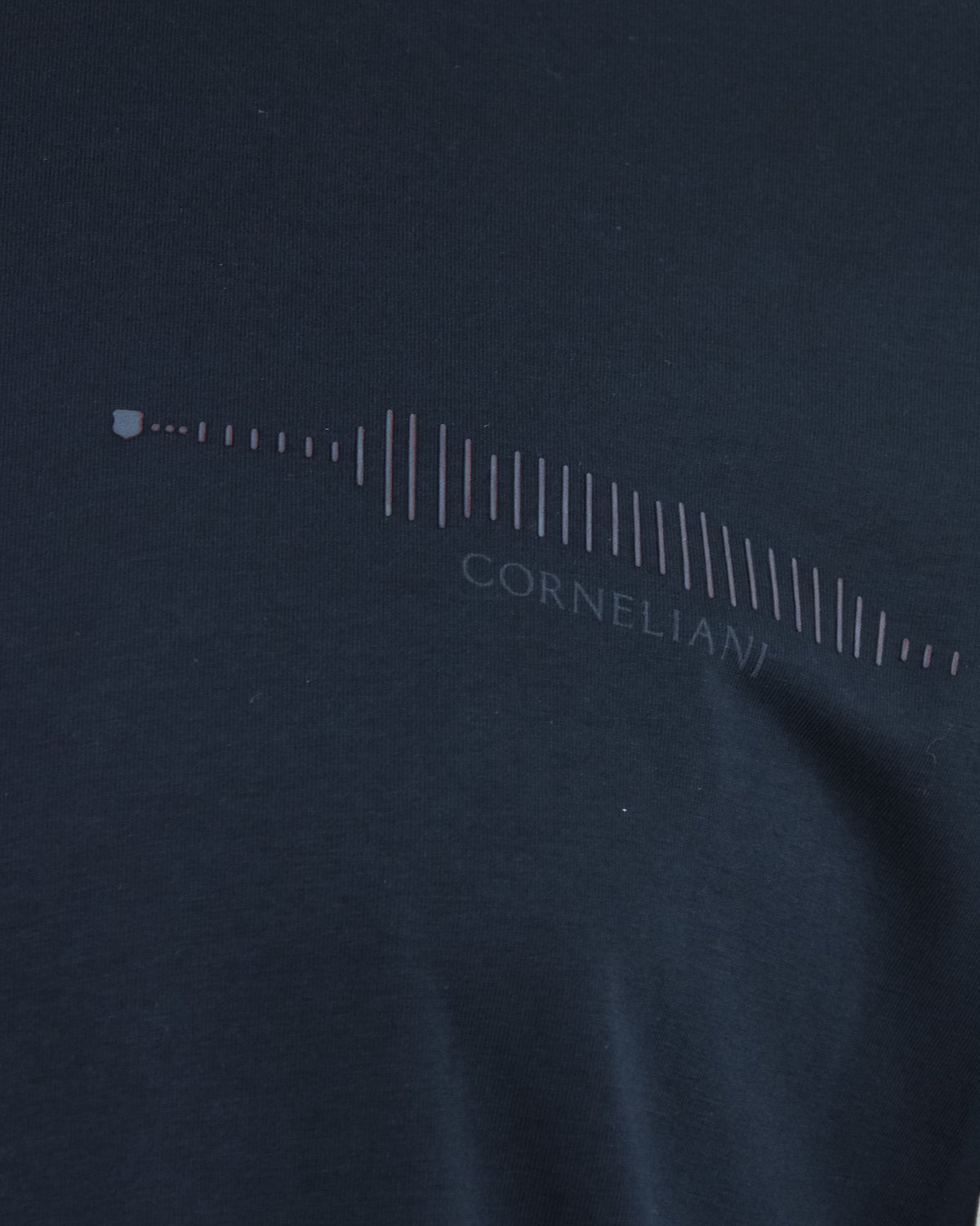 Close-up of navy T-shirt graphic with frequency bars and Corneliani text