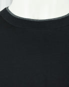 Black crew-neck T-shirt ribbed collar close-up