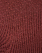 Burgundy textured knit fabric with allover square weave pattern