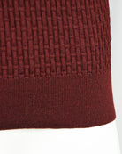 Burgundy textured knit polo hem with ribbed bottom band