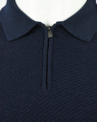 Navy textured knit polo collar with half zipper and metal pull tab