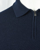 Navy textured knit polo shoulder and stand collar with zipper closure