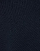 Navy textured knit fabric with fine raised pattern