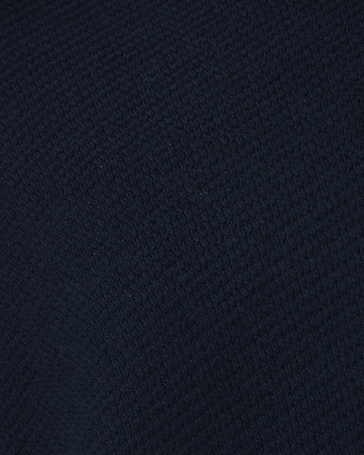 Navy textured knit fabric with fine raised pattern