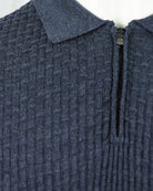 Blue textured knit polo shoulder with collar and front half-zip
