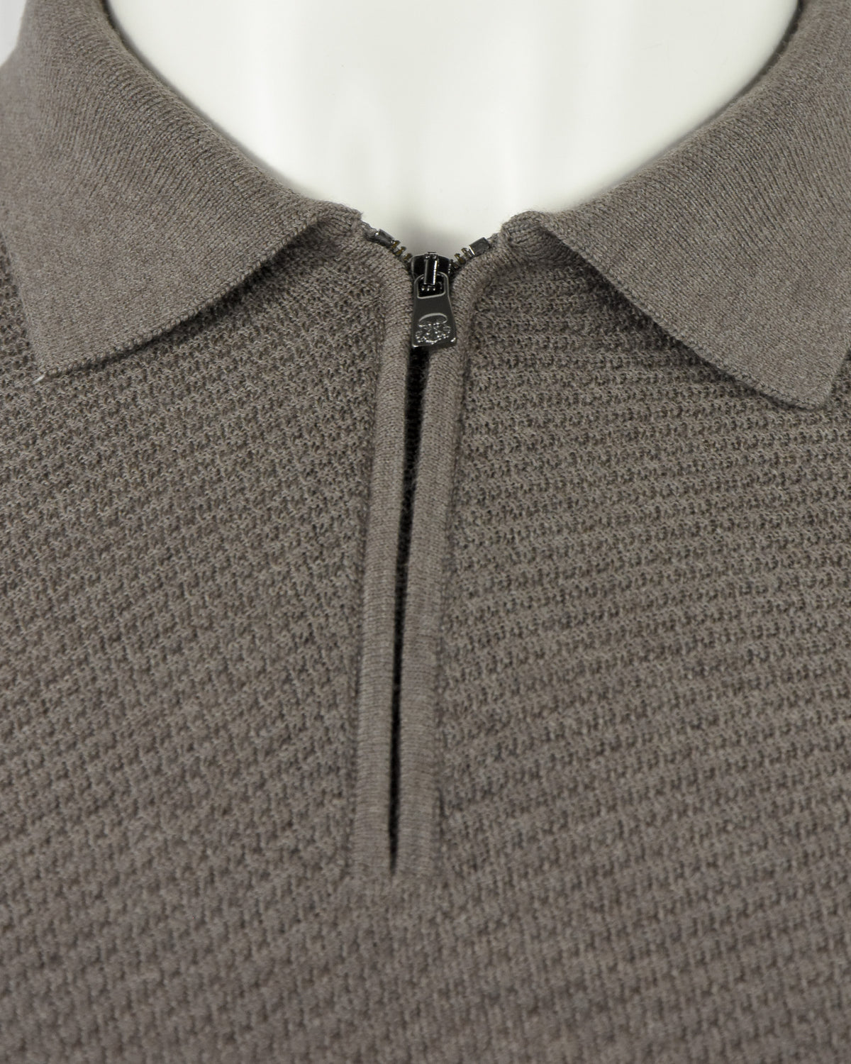 Taupe textured polo neckline with half-zip and mock collar