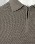 Taupe textured half-zip polo with mock collar and zip pull