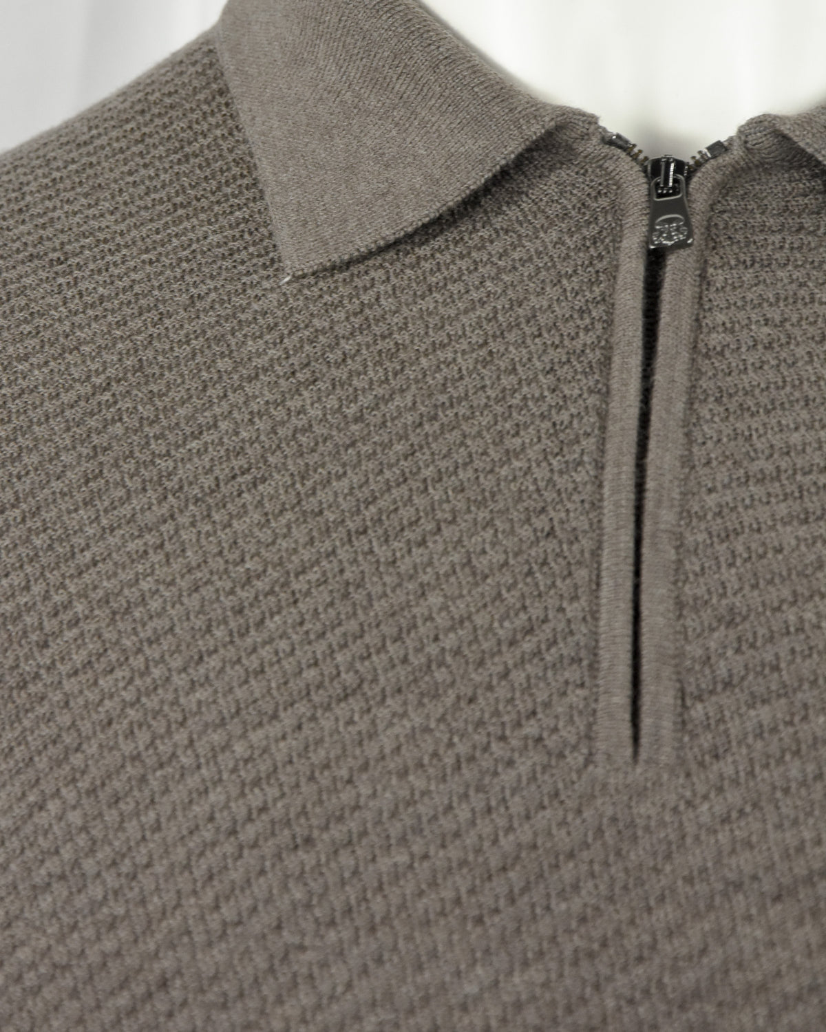 Taupe textured half-zip polo with mock collar and zip pull